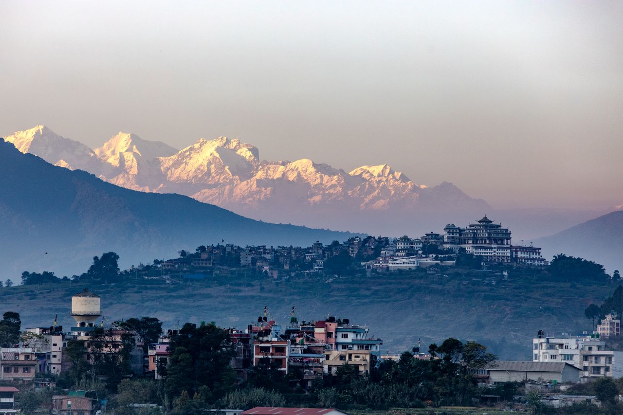 Mastering the First Impression: Your intriguing post title goes here Stunning sunset view of Kathmandu Valley with the Himalayas in the background in Nepal.